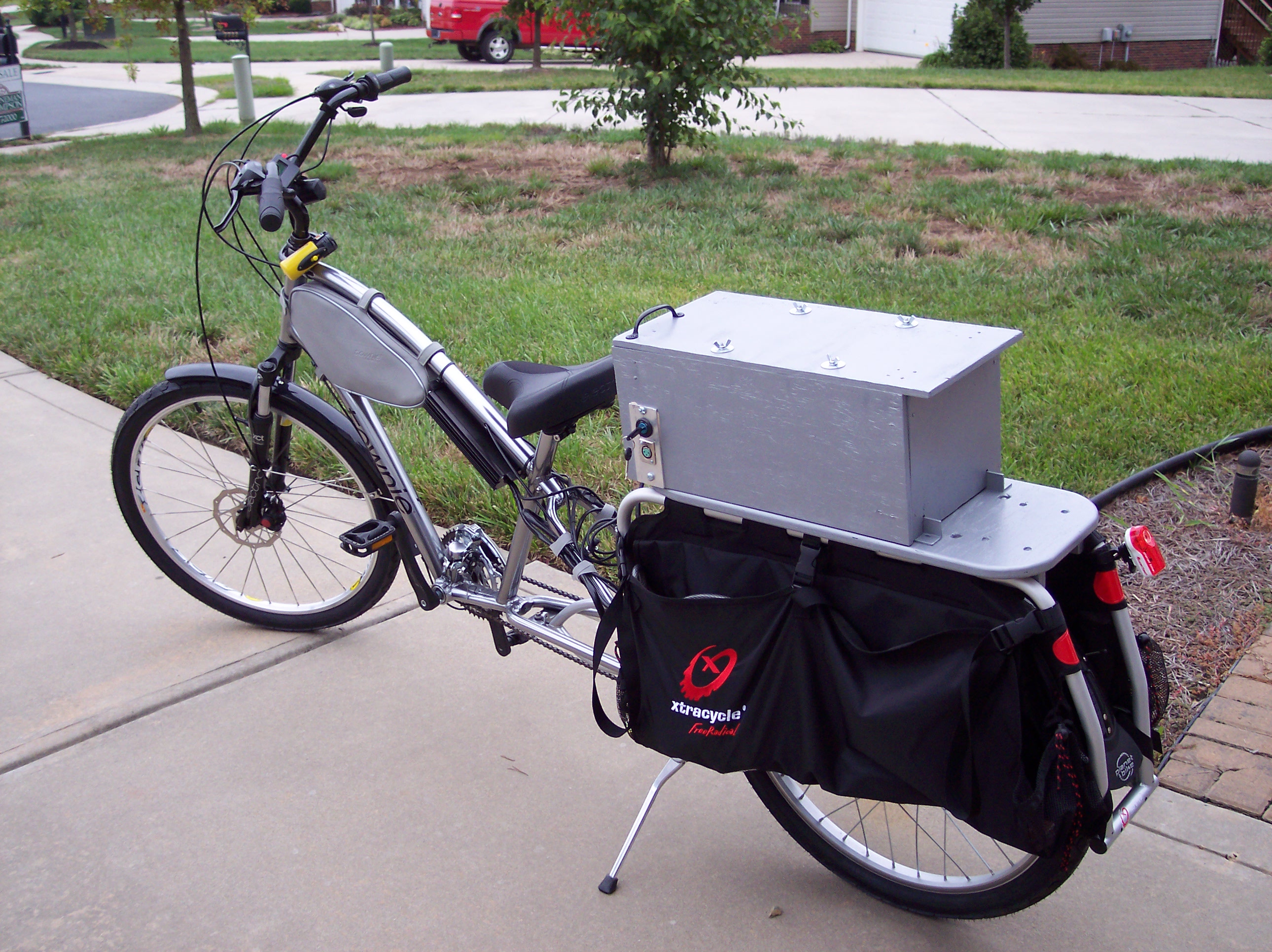 Battery box over the rear wheel